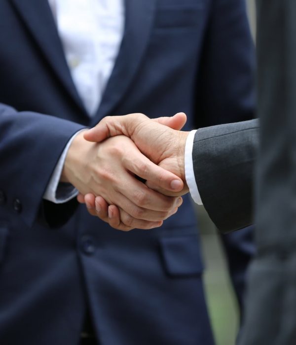 handshake-of-two-men-in-business-suits-partnership-deal-teamwork-team-successful-male-cooperation_t20_8dGYaB.jpg